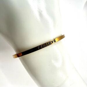Gold tone Believe inspirational open cuff bracelet